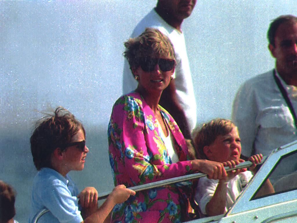 Diana with Prince Harry and Prince William Pictured on board an Italian Navy Boat in 1991.