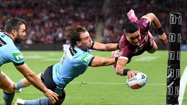 Valentine Holmes of the Maroons scores a try during game three of the State of Origin series in 2020. Picture: Bradley Kanaris / Getty Images