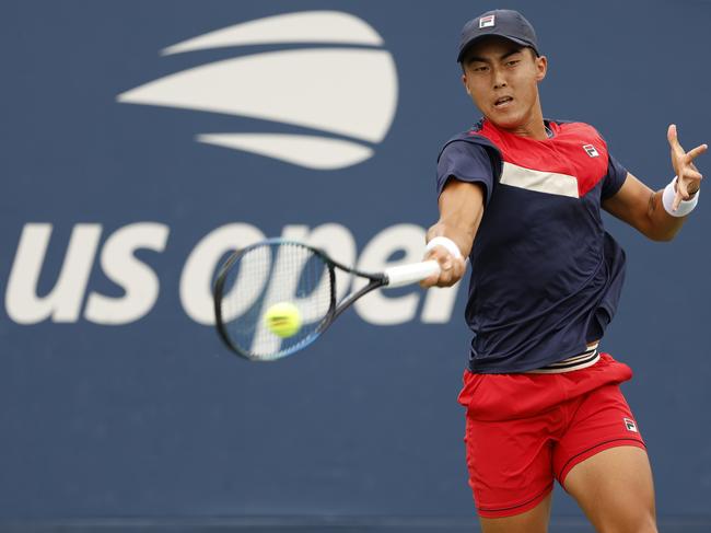 Rinky Hijikata lashes a forehand at Flushing Meadows, before leaving the court to sombre news. Picture: Sarah Stier/Getty Images