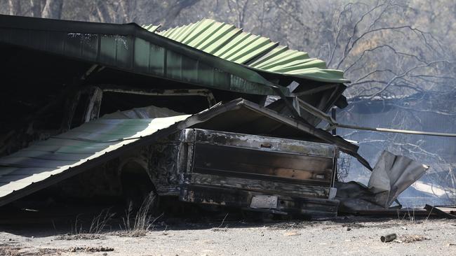 All that remains of the Stanbridge home and family ute. Picture: David Swift.