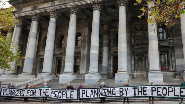 A small protest was held outside State Parliament on Sunday. Numbers were restricted to 10, due to coronavirus. Picture: Russell Millard