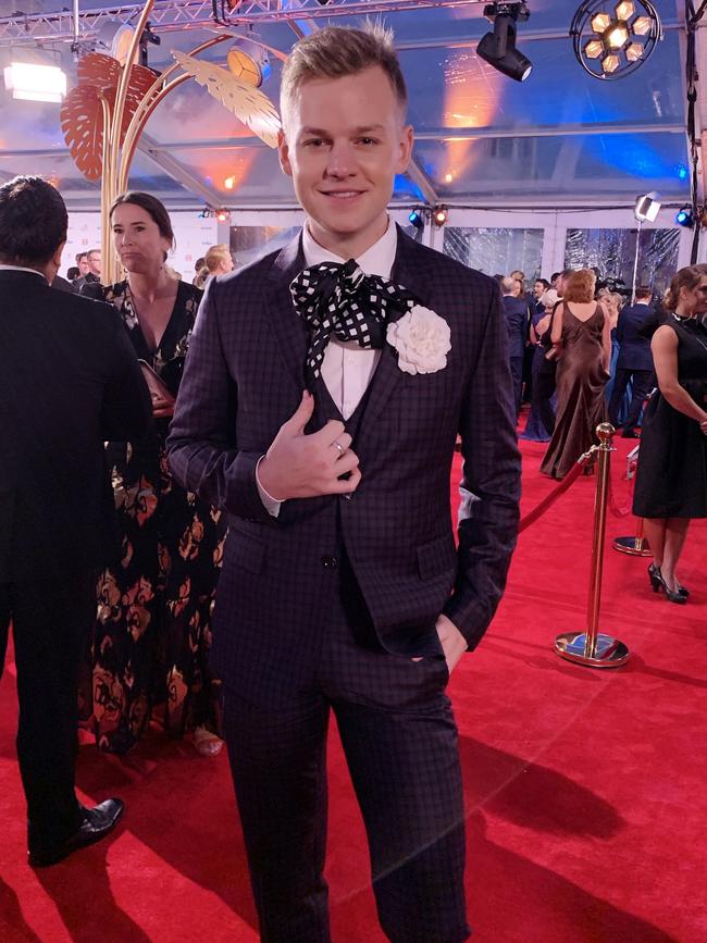 Bold tie and blooms for Joel Creasey. Picture: News Corp Australia