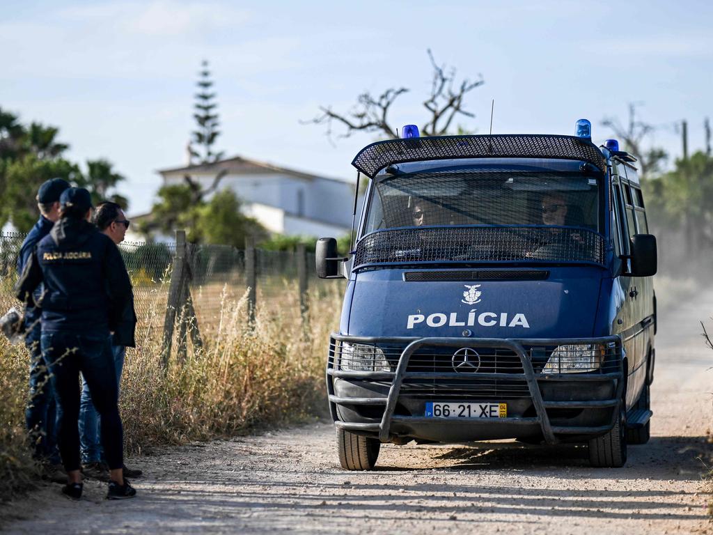 Portuguese Investigation Police arrive in a van on the site where Portuguese Criminal Investigation Police investigators are carrying out new search operations. Picture: Patricia DE MELO MOREIRA / AFP