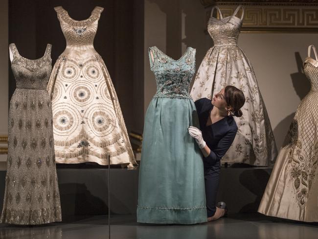 The gowns read like a historical chronicle covering major events over the last 90 years. Picture: Dan Kitwood/Getty Images