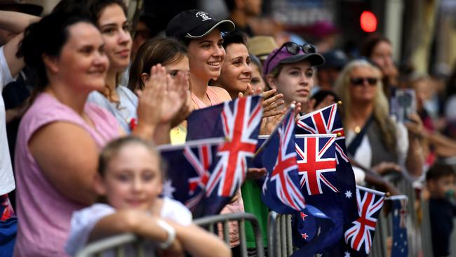 Crowds cheer on marchers during an Anzac Day parade in Brisbane, Wednesday, April 25, 2018. Picture: AAP/Dan Peled