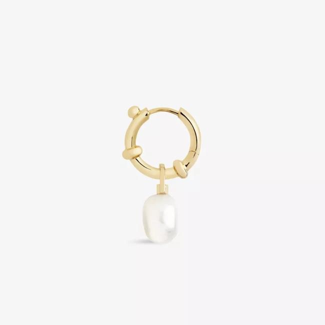 SHOP NOW: Maria Black Cha Cha 22ct yellow gold-plated sterling-silver and pearl hoop earring, $245 from Selfridges