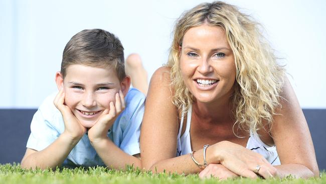 Hutch Bevacqua, now seven, with mum Natasha, whose life he saved. Picture: Lachie Millard