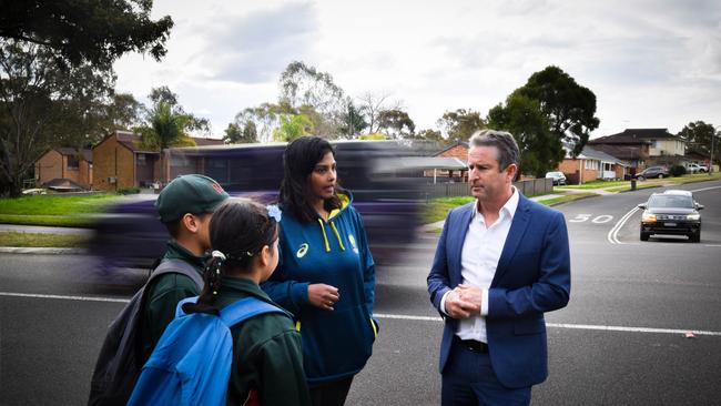 Campbelltown MP Greg Warren meets Ethan Forword with his sister Isabella and mother Alex.