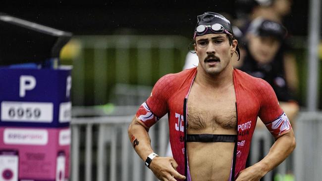 Triathlete Nick Thompson exits the swimming section of the Ironman 70.3 Tasmania in Hobart on Sunday 4th February. Picture: Linda Higginson