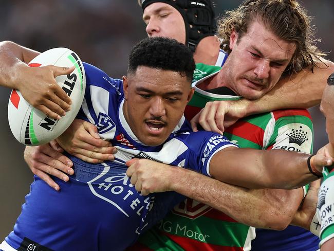 SYDNEY, AUSTRALIA - APRIL 07: Paul Alamoti of the Bulldogs is tackled during the round six NRL match between Canterbury Bulldogs and South Sydney Rabbitohs at Accor Stadium on April 07, 2023 in Sydney, Australia. (Photo by Cameron Spencer/Getty Images)