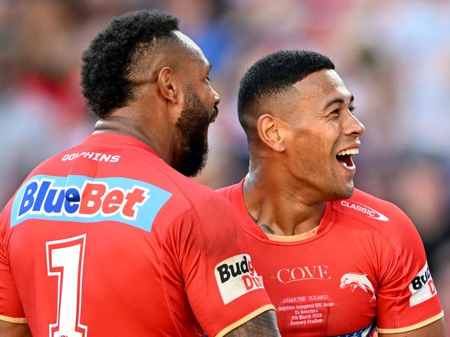 BRISBANE, AUSTRALIA - MARCH 05: Jamayne Isaako of the Dolphins celebrates scoring a try during the round one NRL match between the Dolphins and Sydney Roosters at Suncorp Stadium on March 05, 2023 in Brisbane, Australia. (Photo by Bradley Kanaris/Getty Images)