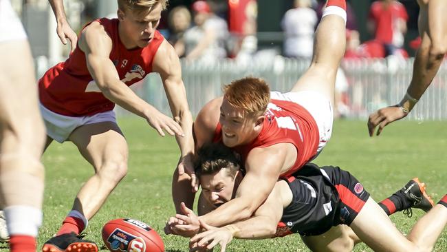 The Roosters were back in top, with Mitch Harvey pouncing on Bloods’ Murray Waite. Picture: Mike Burton/AAP