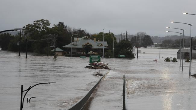 Daily telegraph July 4 / 22. A familiar sight in Windsor the newish bridge under flood water again .picture John Grainger