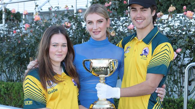 Melbourne Cup Tour ambassador Jamie Kah with Giselle and Gabe Smith. Picture: VRC