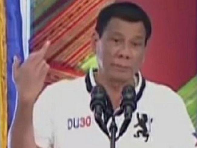Philippine President Rodrigo Duterte makes a rude gesture to media. Picture: Al Jazeera grab