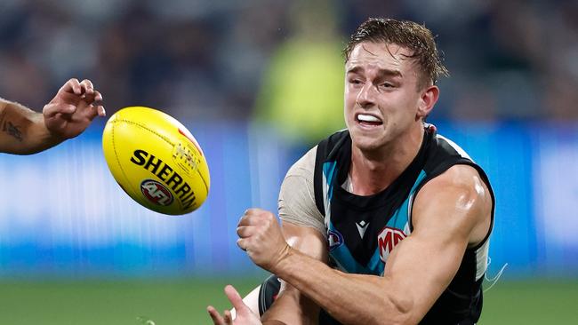 Jackson Mead of the Power handpasses. (Photo by Michael Willson/AFL Photos via Getty Images)