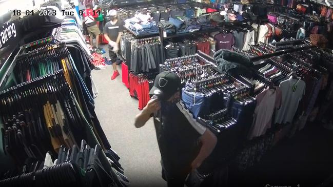 Three men captured inside Intersport Yeppoon stealing clothing.