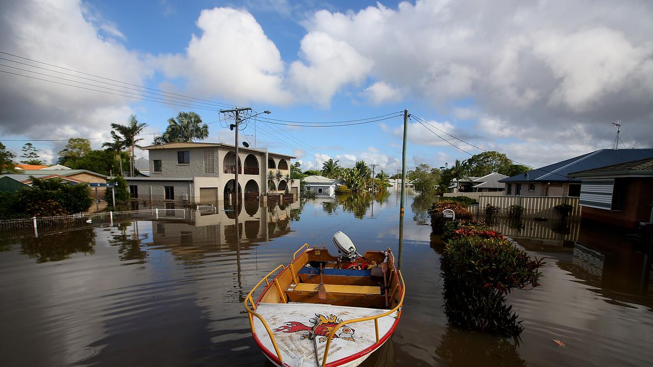 BUNDABERG, AUSTRALIA - JANUARY 30: Streets of Bundaberg underwater as parts of southern Queensland experiences record flooding in the wake of Tropical Cyclone Oswald on January 30, 2013 in Bundaberg, Australia. Flood waters peaked at 9.53 metres in Bundaberg yesterday and began receding overnight, as residents and relief teams prepare to clean-up debris. Four deaths have been confirmed in the Queensland floods and the search is on for two men though to be missing in floodaters in Gatton. (Photo by Chris Hyde/Getty Images)