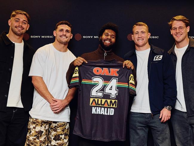 American pop superstar Khalid with Penrith players  Mavrik Geyer, Nathan Cleary, Mitch Kenny and Riley Price backstage at the Sydney Opera House ahead of his second sold out Sincere world premiere show. Credit:  Brayden Smith / Supplied