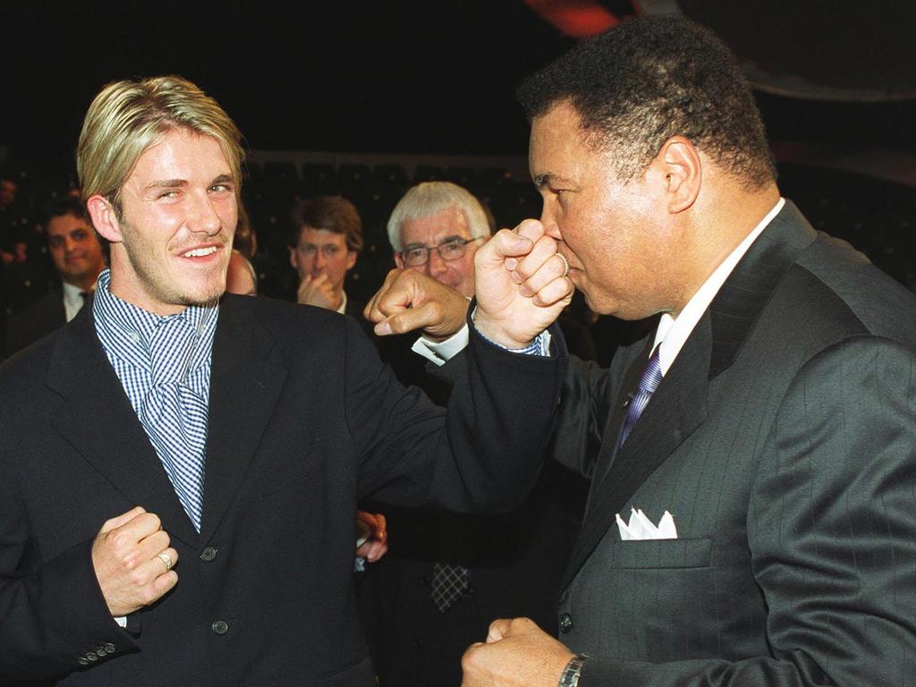 December 12, 1999: British soccer player David Beckham with Ali at the BBC Sports Personality of the Year Awards in London. Ali won the award for Sports Personality of the Century.