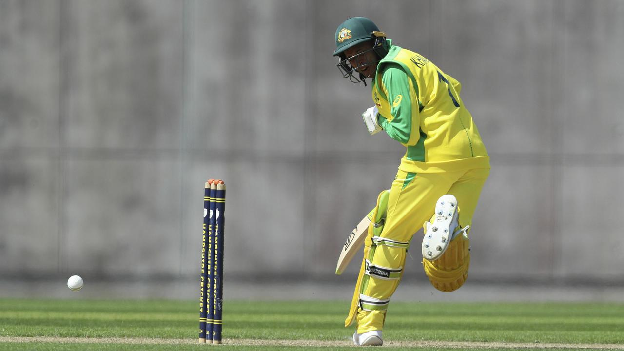 Australia's Usman Khawaja is struck in the head during a World Cup warm up match.