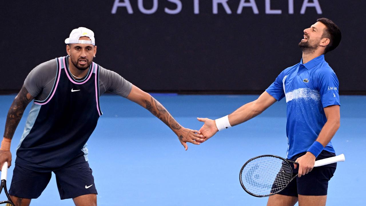 Nick Kyrgios (left) has withdrawn from a match against Novak Djokovic at Rod Laver Arena on Thursday night. Picture: William West / AFP