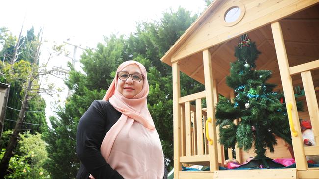 Mahboba Rawi at her home in Sydney, where she is raising the 10 young Afghan orphans she helped rescue from Afghanistan as the country fell. Picture: John Feder