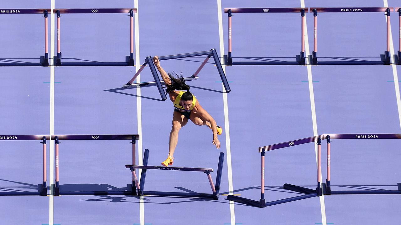 Michelle Jenneke of Team Australia knocks over a hurdle. (Photo by Patrick Smith/Getty Images)