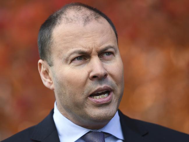 Australian Minister for the Environment and Energy Josh Frydenberg speaks to the media during a press conference at Parliament House in Canberra, Monday, May 21, 2018. AGL announced on Monday it had knocked back the purchase request from Alinta Energy to buy the Liddell power station for  $250 million because it wasn't in its best interests, despite government pressure. (AAP Image/Lukas Coch) NO ARCHIVING