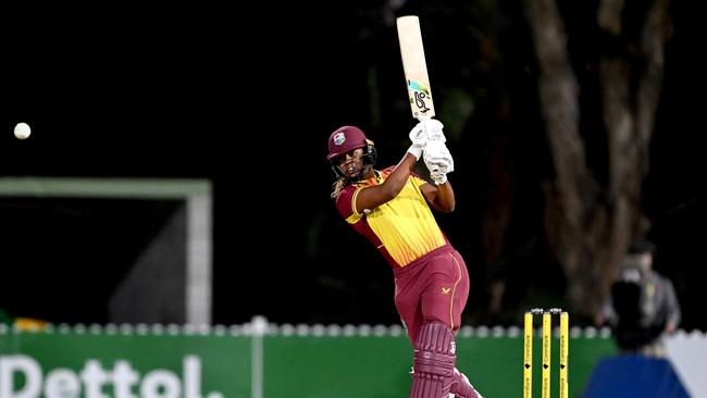 Hayley Matthews hits the ball to the boundary at Allan Border Field. Picture: Bradley Kanaris/Getty Images