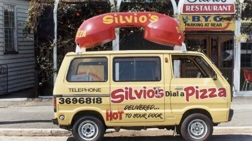 Silvio's Dial a Pizza was known for its bright yellow delivery vans, with a big red phone on top. Picture: Redcliffe Book