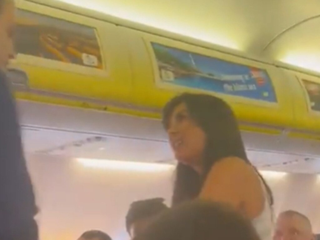 The woman hurled abuse at a crew member as she left the plane. Picture: Twitter