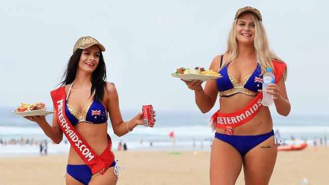 Brearna Newman and Jade Ellis on Surfers Paradise beach. Photo: Tim Marsden