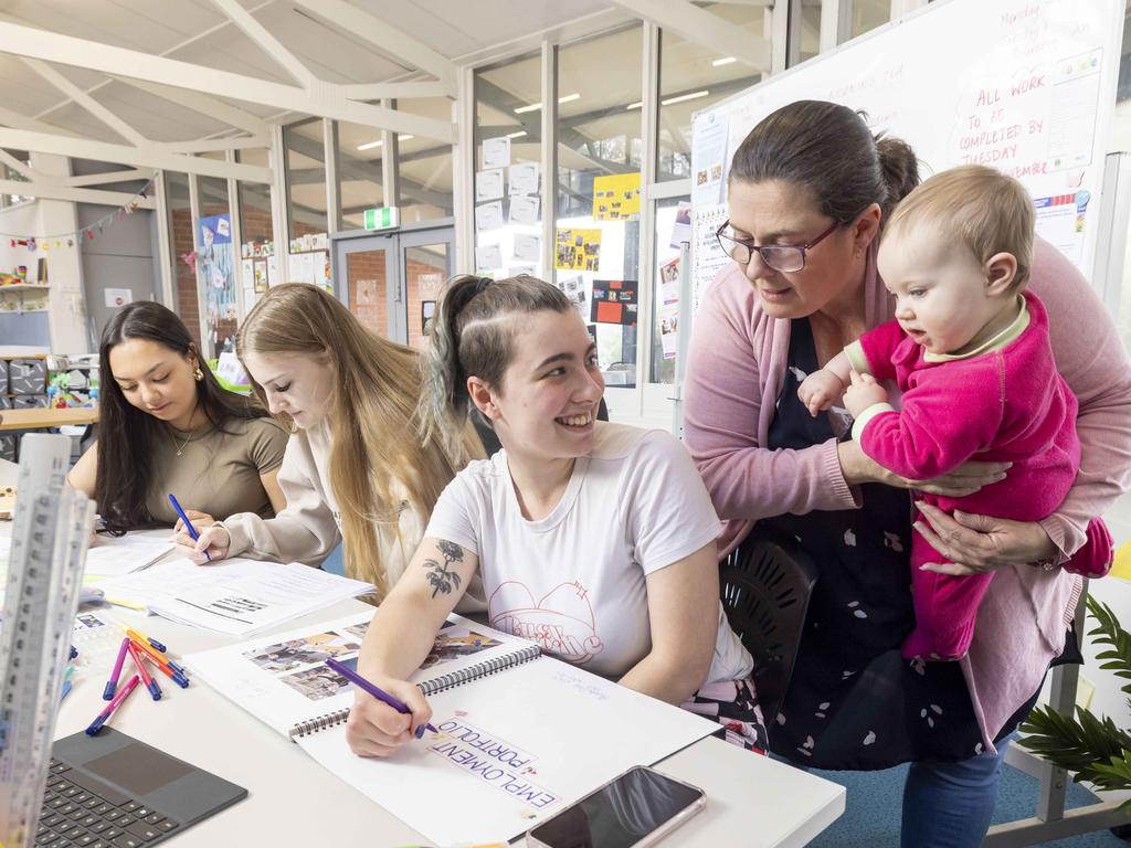 Early parenting support worker Donna Strickleton helps to look after the babies while young mothers complete their education. Picture: Wayne Taylor