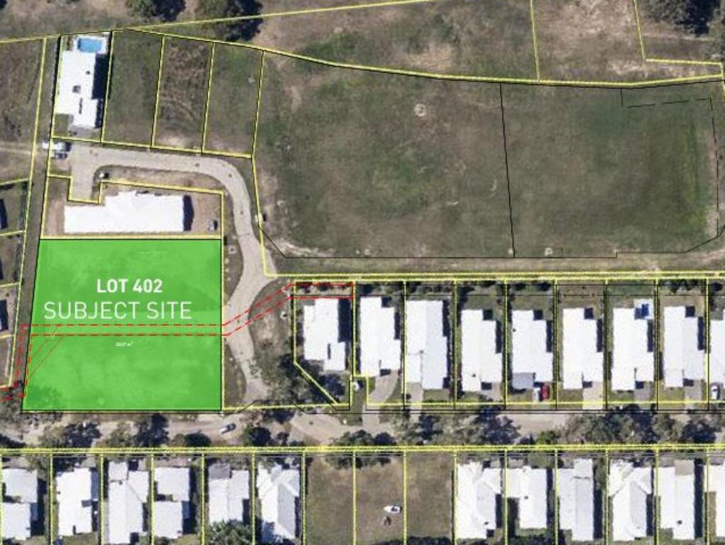 The townhouses will be built on lot 402, while the large vacant lot nearby will be transformed into apartment buildings.