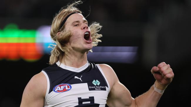 ADELAIDE, AUSTRALIA - MAY 30: Tom De Koning of the Blues celebrates a goal during the 2024 AFL Round 12 match between the Port Adelaide Power and the Carlton Blues at Adelaide Oval on May 30, 2024 in Adelaide, Australia. (Photo by James Elsby/AFL Photos via Getty Images)