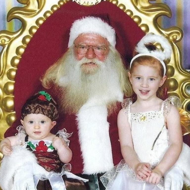 Charlize and Stephanie Zmuda with Santa.