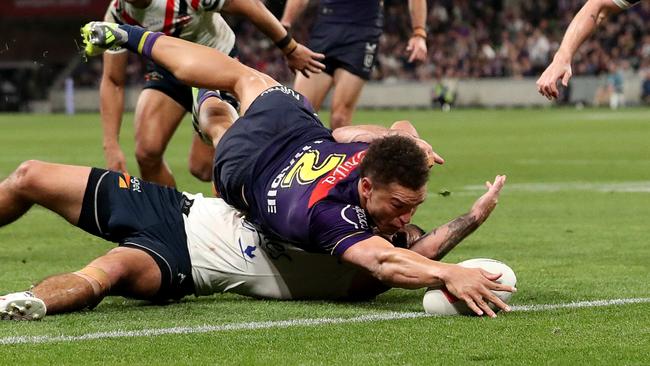 MELBOURNE, AUSTRALIA - SEPTEMBER 15: Will Warbrick of the Storm scores a try during the NRL Semi Final match between Melbourne Storm and the Sydney Roosters at AAMI Park on September 15, 2023 in Melbourne, Australia. (Photo by Kelly Defina/Getty Images)