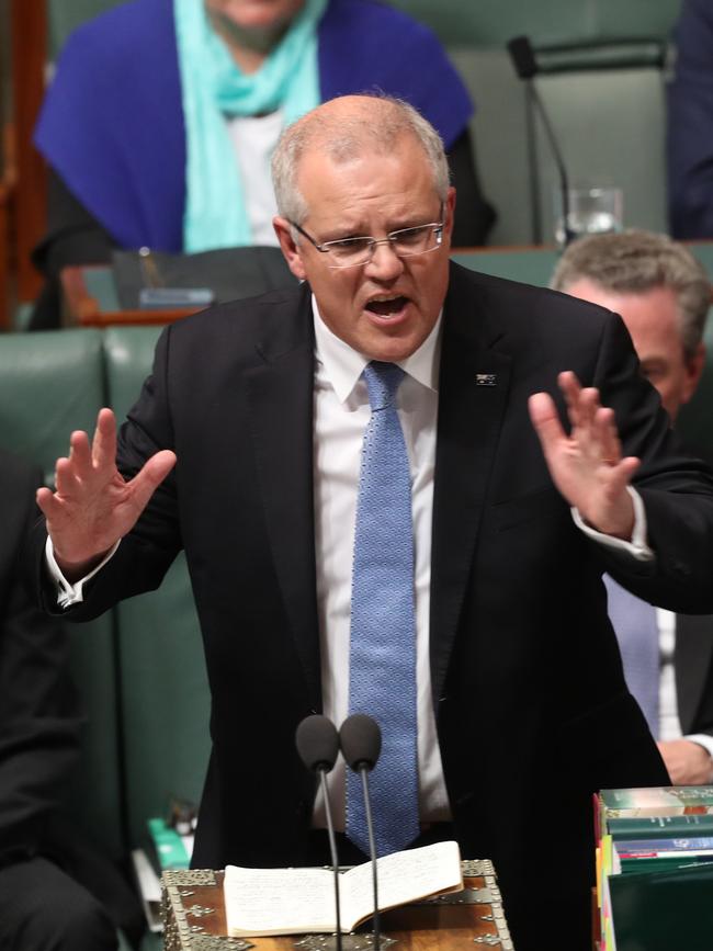 Mr Morrison gave his Cabinet a pep talk before taking the floor. Picture: Kym Smith