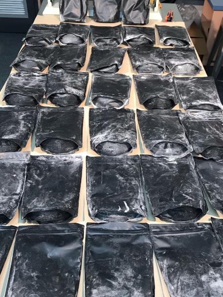 More than 300,000 steroid tablets, along with weapons and drug making equipment were uncovered at Prospect. Picture: SA Police