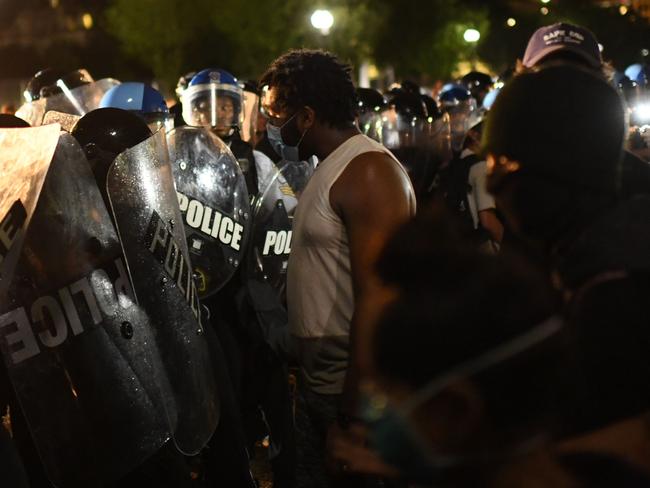 Protesters face off with police outside the White House in Washington, DC. Picture: AFP