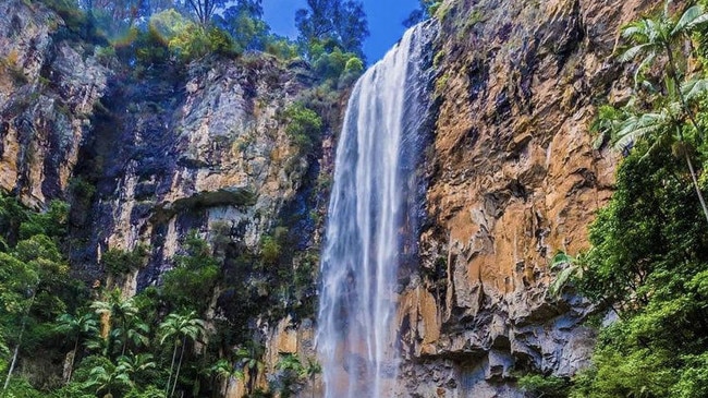 A Victorian man has fallen to his death from a waterfall on the Gold Coast.