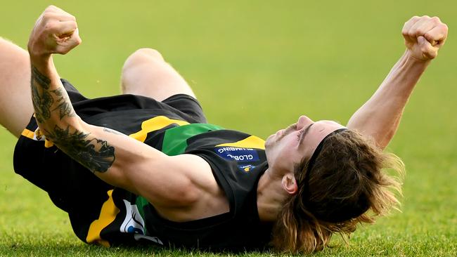 Jai Taylor of Dromana celebrates kicking a goal. (Photo by Josh Chadwick)