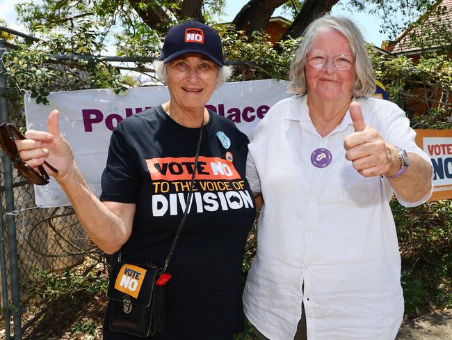 NO and YES volunteers Jeanette Glasgow, left, and Carol Nevin, right, at the Glebe Road Kindy voting booth in Queensland. Picture: Tertius Pickard