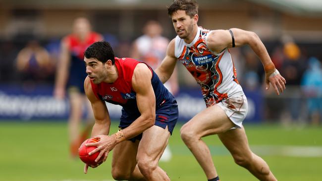 Melbourne star Christian Petracca and Giant Callan Ward. Picture: Michael Willson/AFL Photos