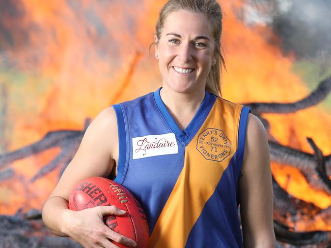 5.6.2019.Casey McElroy, 27, on the family farm at Marcollat with her dad Bradley,52 and grandfather Jeffrey,81.Casey  played in the men's reserves footy team for Padthaway last month and the club has been fined $1000. PIC TAIT SCHMAAL.