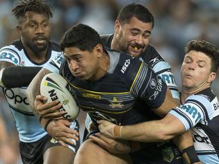 Jason Taumalolo of the Cowboys is tackled by Andrew Fifita and Chad Townsend of the Sharks during the NRL elimination final between the Cronulla Sutherland Sharks and the North Queensland Cowboys at Allianz Stadium in Sydney, Sunday, September 10, 2017. (AAP Image/Craig Golding) NO ARCHIVING, EDITORIAL USE ONLY