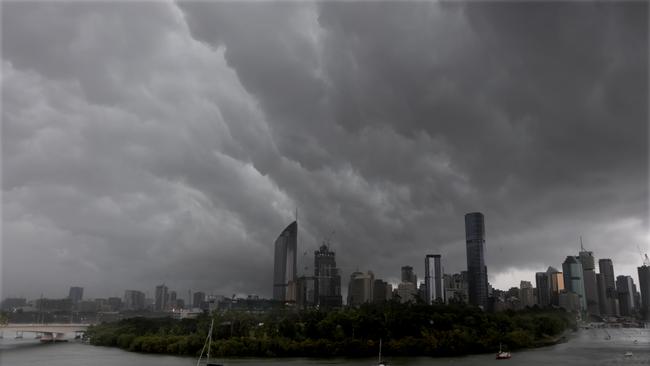 Storms roll in over Brisbane on Sunday afternoon. Picture: Steve Pohlner