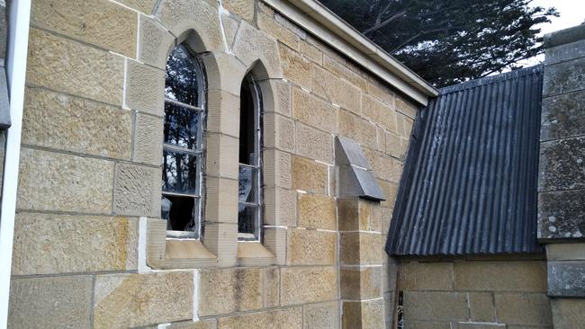 Smashed windows at St Ann's Church and Cemetery at Dysart.