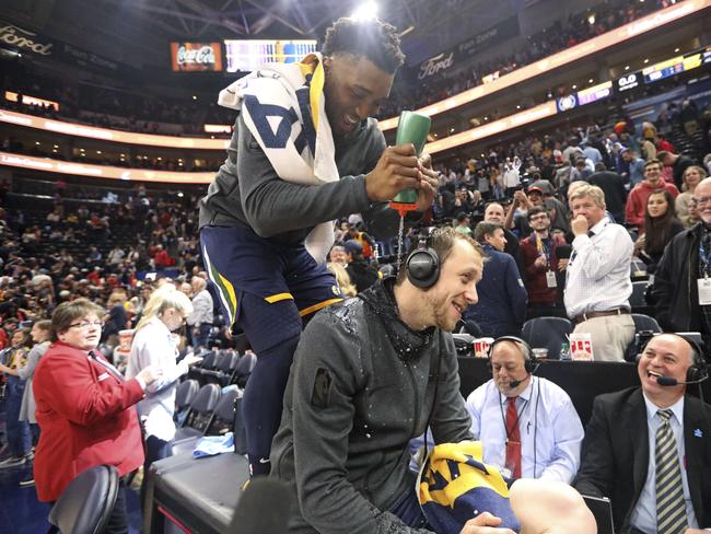 Utah Jazz guard Donovan Mitchell gives Joe Ingles a Gatorade shower after his stunning performance. Picture: AP